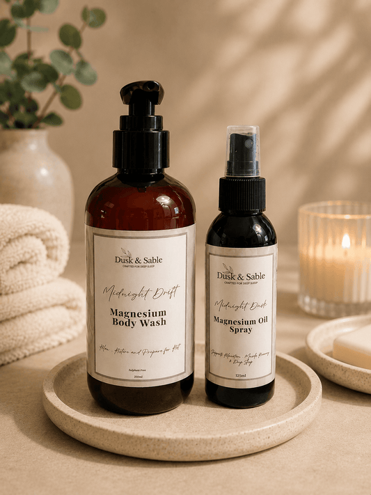 Midnight Magnesium Night Relax and Recover bundle with amber magnesium body wash and spray bottles on a beige tray, beside a .